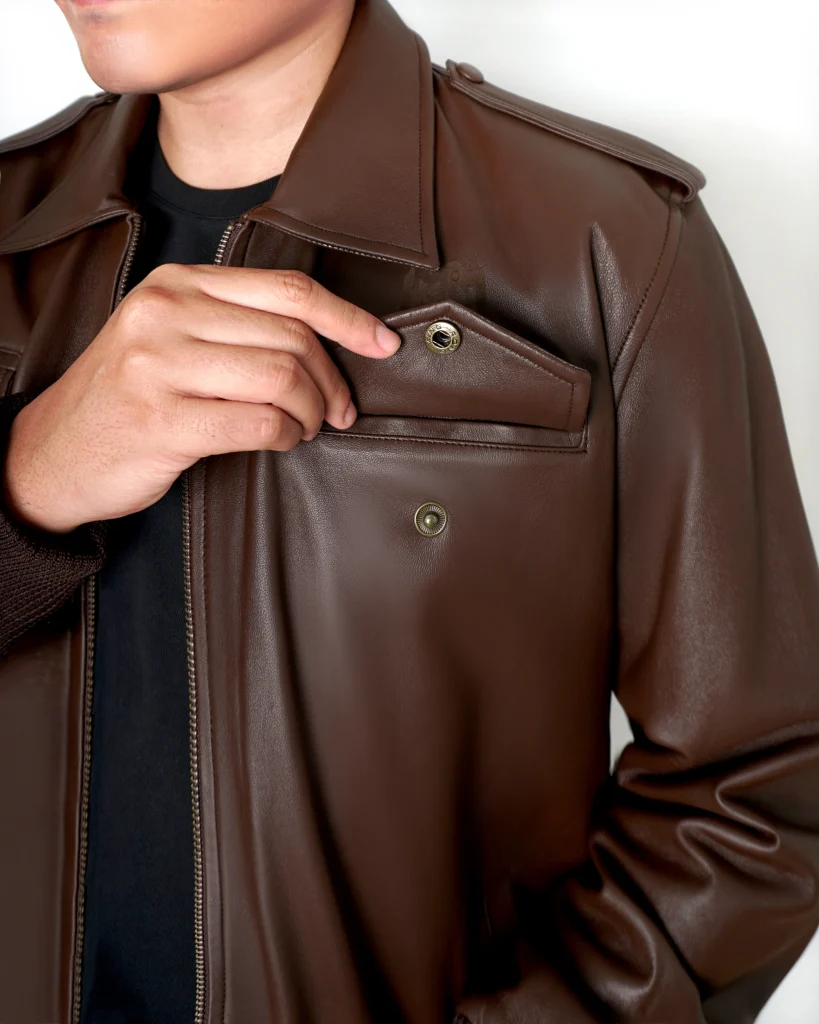 detail kantong jaket kulit pertamina laki laki